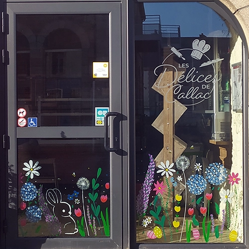 Peinture de printemps pour décorer la vitrine de la boulangerie-pâtisserie Les Délices de Callac par la graphiste Mélanie Appéré